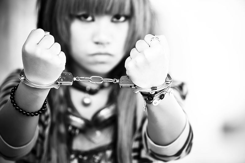 Girl in handcuffs