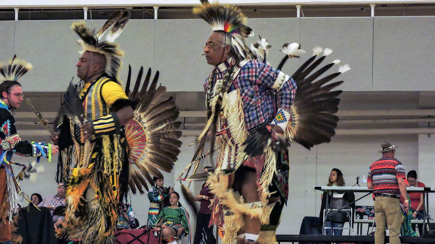 Native man dancing in tribal dress