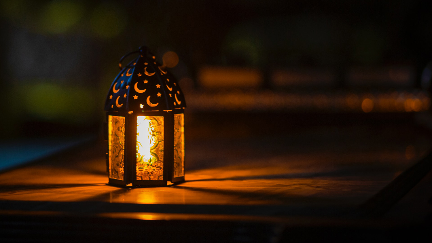 Lantern on table at night