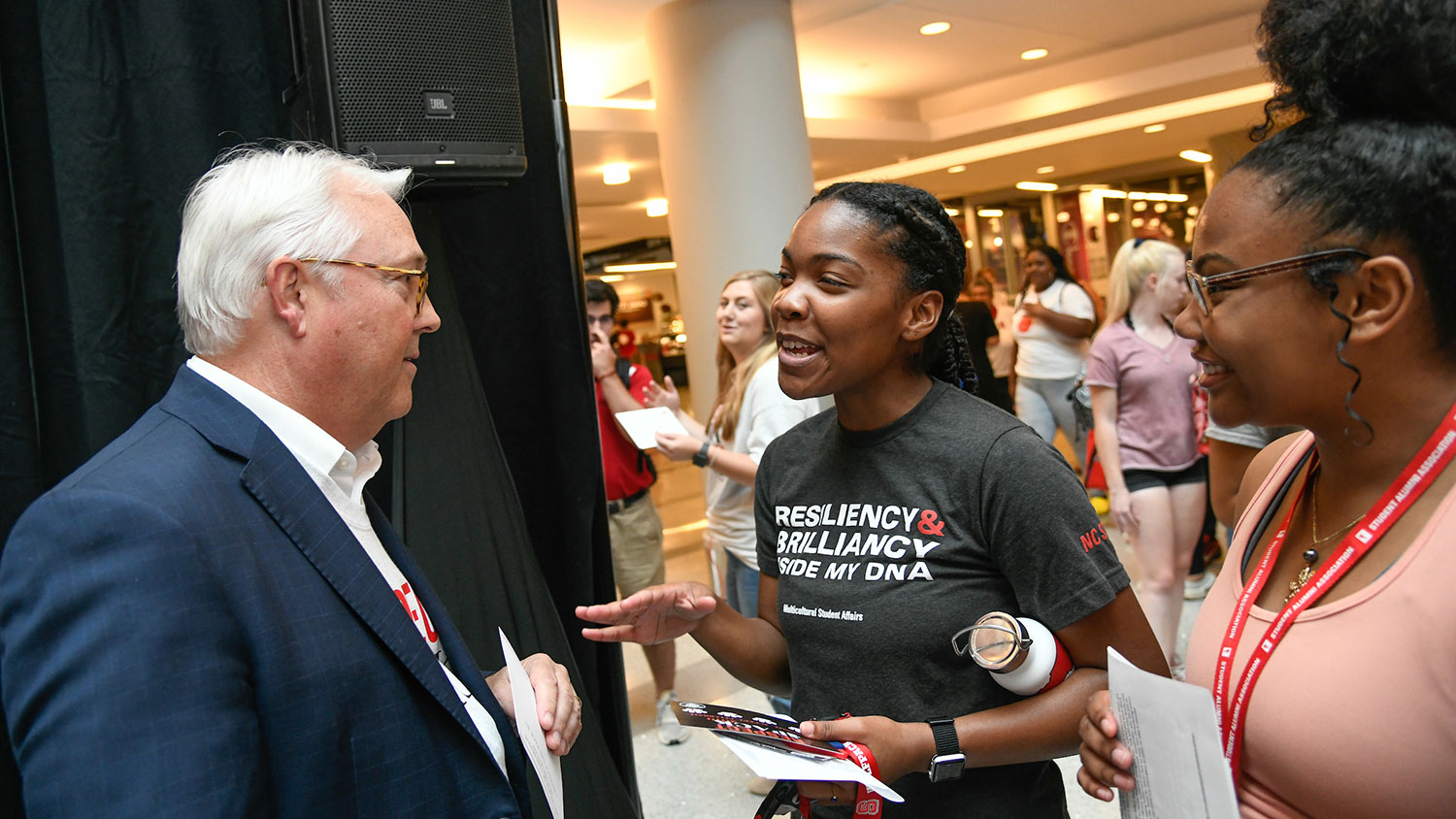 Chancellor Randy Woodson with students at Respect the Pack event
